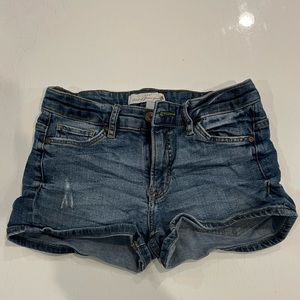 H&M L.O.G.G. Super short denim jean shorts with light distress. Medium wash.
